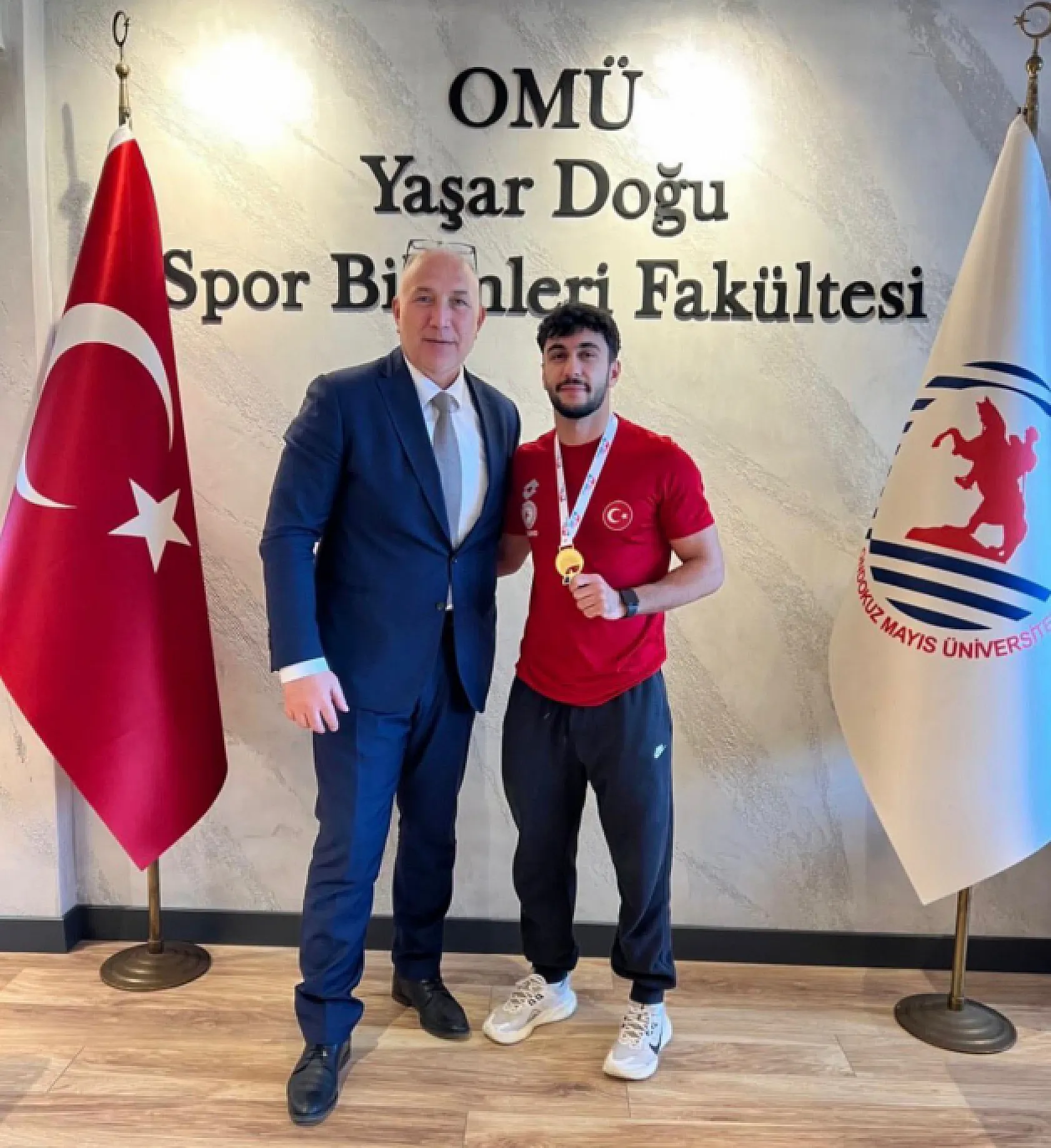 OMÜ'lü milli sporcudan çifte gurur