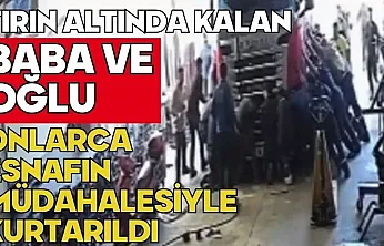 Tırın altında kalan baba ve oğlu esnafın müdahalesiyle kurtarıldı
