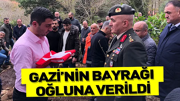 GAZİ'NİN BAYRAĞI OĞLUNA VERİLDİ