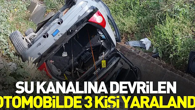 OTOMOBİL SU KANALINA DEVRİLDİ