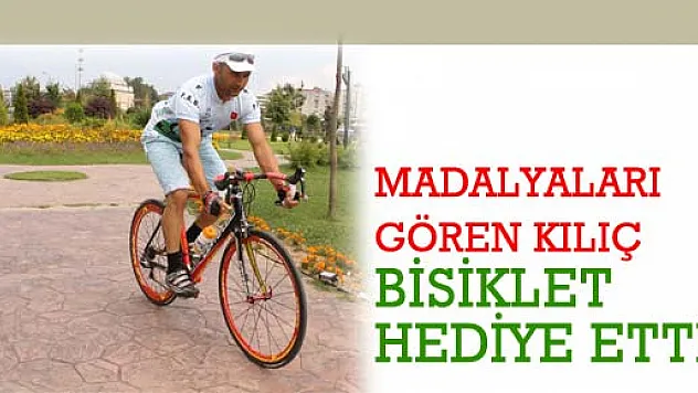 MADALYALARI GÖREN KILIÇ BİSİKLET HEDİYE ETTİ