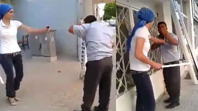 Kadın, adamı sopayla dövdü