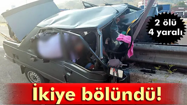 Bariyerlere çarpan otomobil ikiye bölündü