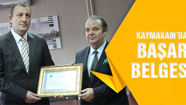 KAYMAKAM YILDIZ'DAN BAŞHEKİM BİLGİN'E BAŞARI BELGESİ