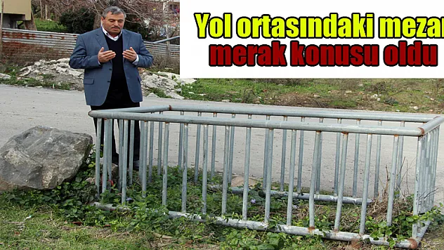 Yol ortasındaki mezar merak konusu oldu