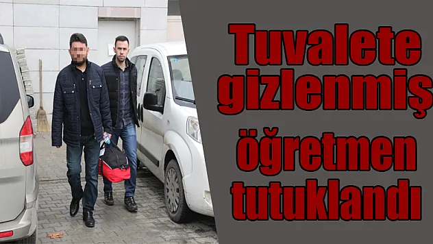 Tuvalete gizlenmiş bilgisayar ve cep telefonlarıyla yakalanan öğretmen tutuklandı