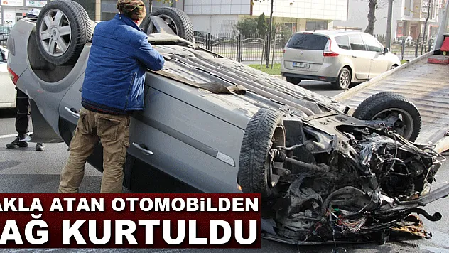 Takla atan otomobilden sağ kurtuldu
