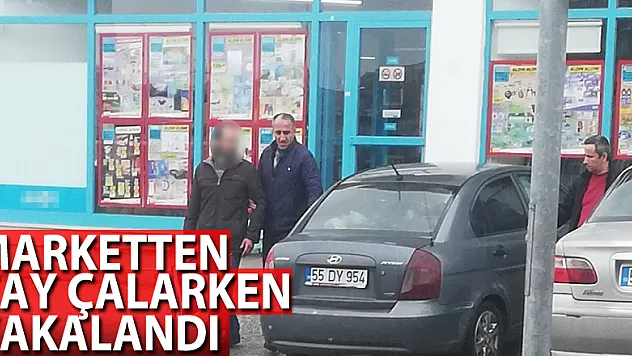 Marketten çay çalarken yakalandı