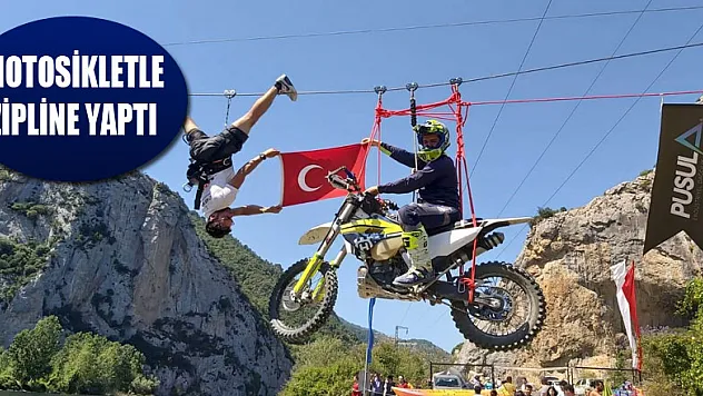 Motosikletle zipline yaptı