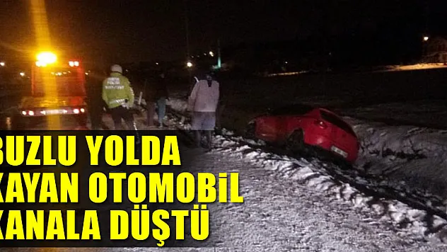 Buzlu yolda kayan otomobil kanala düştü