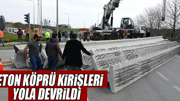 Tırın üzerindeki tonlarca ağırlığındaki beton köprü kirişleri yola devrildi