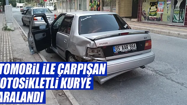 Otomobil ile çarpışan motosikletli kurye yaralandı