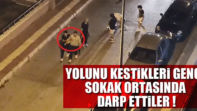 Yolunu kestikleri genci sokak ortasında darp ettiler