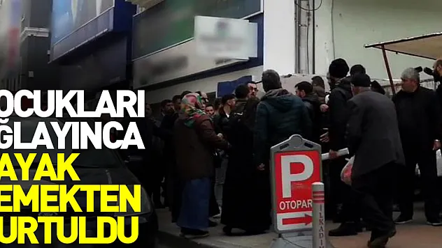 Çocukları ağlayınca meydan dayağı yemekten kurtuldu