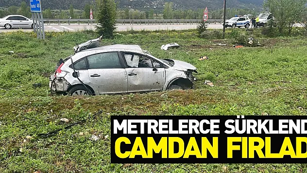 Metrelerce sürüklenen otomobilin camından fırlayan sürücü ağır yaralandı
