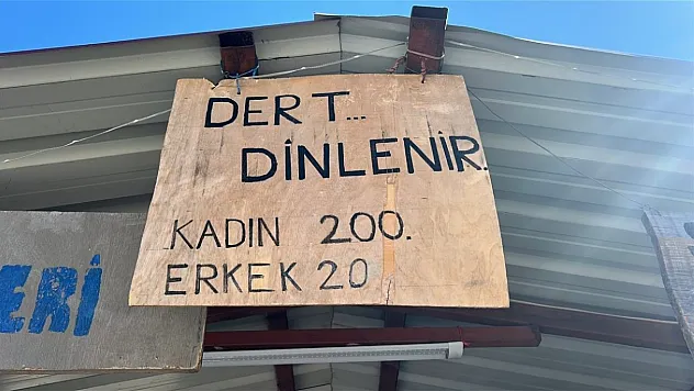 İş yerine astığı tabelayla yüzleri gülümsetti