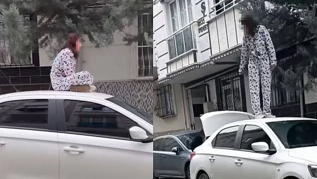 Otomobilin Üzerine Çıkıp Zıpladı
