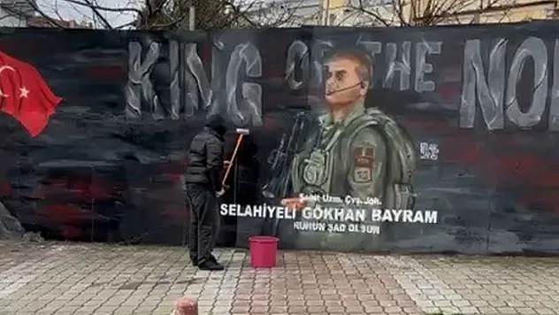Şehidin portresine vefa: Başkan Doğan'dan gence hediye!